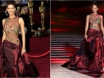 At the 1001 Seasons runway show, Halle Berry revisited her iconic red Elie Saab gown, worn during her 2002 Oscars win.