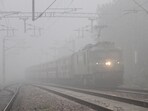 A train running on the track amid heavy smog in Gurugram on Wednesday.