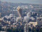 Smoke rises between buildings hit by an Israeli airstrike in Dahiyeh, the southern suburb of Beirut, Lebanon, Thursday, Nov. 14, 2024. (AP Photo/Hussein Malla) Smoke rises between buildings hit by an Israeli airstrike in Dahiyeh, the southern suburb of Beirut, Lebanon, Thursday, Nov. 14, 2024. (AP Photo/Hussein Malla)