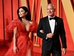 Lauren Sanchez, left, and Jeff Bezos arrive at the Vanity Fair Oscar Party Lauren Sanchez, left, and Jeff Bezos arrive at the Vanity Fair Oscar Party