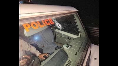 A damaged police vehicle after the encounter with a murder accused near Panipat on Wednesday night. (HT Photo)
