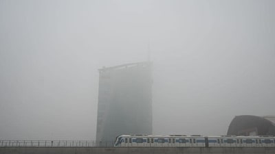 A metro runs braves through smog-induced low visibility at Cyber City metro station near DLF Gateway Tower on Wednesday, when Gurugram air quality index (AQI) dropped to “very poor” levels, logging a reading of 321. (Parveen Kumar/HT Photo) A metro runs braves through smog-induced low visibility at Cyber City metro station near DLF Gateway Tower on Wednesday, when Gurugram air quality index (AQI) dropped to “very poor” levels, logging a reading of 321. (Parveen Kumar/HT Photo)