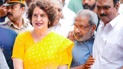 Priyanka Gandhi Vadra visits a polling booth to meet voters for the by-elections, in Wayanad on Wednesday. (ANI)