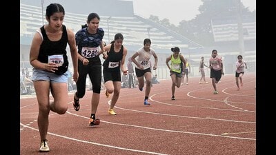 Athletes in action during the school games at Guru Nanak Stadium in Ludhiana on Thursday. (Manish/HT)