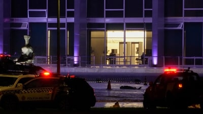 A body lies outside the Supreme Court in Brasília, Brazil, following an explosion (AP) A body lies outside the Supreme Court in Brasília, Brazil, following an explosion (AP)