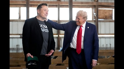 FILE - Tesla and SpaceX CEO Elon Musk, left, and President-elect Donald Trump attend a campaign event at the Butler Farm Show on Oct. 5, 2024, in Butler, Pa. (AP Photo/Alex Brandon, File) (AP) FILE - Tesla and SpaceX CEO Elon Musk, left, and President-elect Donald Trump attend a campaign event at the Butler Farm Show on Oct. 5, 2024, in Butler, Pa. (AP Photo/Alex Brandon, File) (AP)