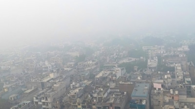 An aerial view shows houses engulfed in smog in New Delhi on November 14. The worsening air pollution has surged past 50 times the World Health Organization's recommended daily maximum. (AFP) An aerial view shows houses engulfed in smog in New Delhi on November 14. The worsening air pollution has surged past 50 times the World Health Organization's recommended daily maximum. (AFP)