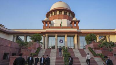 Lawyers at the Supreme Court complex in New Delhi. (PTI Photo)