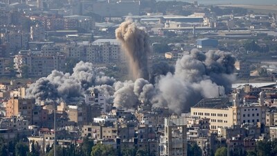 Smoke rises between buildings hit by an Israeli airstrike in Dahiyeh, the southern suburb of Beirut, Lebanon, Thursday, Nov. 14, 2024. (AP Photo/Hussein Malla) (AP) Smoke rises between buildings hit by an Israeli airstrike in Dahiyeh, the southern suburb of Beirut, Lebanon, Thursday, Nov. 14, 2024. (AP Photo/Hussein Malla) (AP)