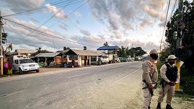Manipur police commandos stand guard along the Imphal-Moirang road amid militant activity in Ningthoukhong town at Bishnupur district (AFP) Manipur police commandos stand guard along the Imphal-Moirang road amid militant activity in Ningthoukhong town at Bishnupur district (AFP)
