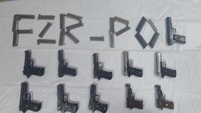 Punjab Police seized a cache of weapons, including 11 pistols and 21 magazines, from two motorcycle-borne suspects in Ferozepur district on Wednesday night. (HT Photo) Punjab Police seized a cache of weapons, including 11 pistols and 21 magazines, from two motorcycle-borne suspects in Ferozepur district on Wednesday night. (HT Photo)