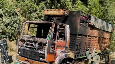 The remains of a truck set ablaze by militants in Jiribam district, Manipur, on Wednesday. (PTI) The remains of a truck set ablaze by militants in Jiribam district, Manipur, on Wednesday. (PTI)