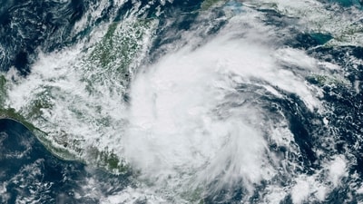 This GOES-16 GeoGolor satellite image taken Thursday, Nov. 14, 2024, at 12:50 p.m. EST and provided by the National Oceanic and Atmospheric Administration (NOAA), shows Tropical Storm Sara. (AP) This GOES-16 GeoGolor satellite image taken Thursday, Nov. 14, 2024, at 12:50 p.m. EST and provided by the National Oceanic and Atmospheric Administration (NOAA), shows Tropical Storm Sara. (AP)