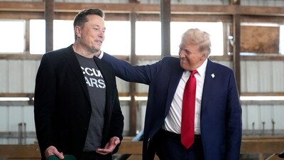Elon Musk was one of the Trump aides seen leaving the president-elect's aircraft on Wednesday morning as he traveled to Washington, DC, to meet with Republican leaders and President Joe Biden. (AP) Elon Musk was one of the Trump aides seen leaving the president-elect's aircraft on Wednesday morning as he traveled to Washington, DC, to meet with Republican leaders and President Joe Biden. (AP)