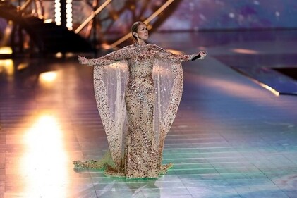 Celine Dion in a sparkling cape fantasy Celine Dion in a sparkling cape fantasy