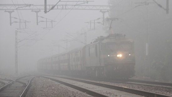 A train running on the track amid heavy smog in Gurugram on Wednesday.