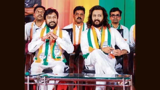 At a recent rally for Congress candidate in Latur Rural, Dhiraj Deshmukh (left), his brother and actor Riteish Deshmukh spoke against the BJP “using religion to seek votes”. (HT Photo)