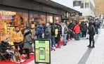 Customers line-up in front of a branch of chocolate producer Lindt before the sale of 100 Dubai Chocolate bars starts in Stuttgart, southern Germany,(AP)