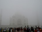 Taj Mahal in Agra remains completely hidden by the thick smog in northern India, as visitors continue to flock the monument.&nbsp;(REUTERS)