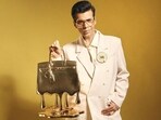 Karan Johar wore 'a pop culture installation by Sanuj Birla' and brooch by Schiaparelli. (Instagram/ Karan Johar) Karan Johar wore 'a pop culture installation by Sanuj Birla' and brooch by Schiaparelli. (Instagram/ Karan Johar)