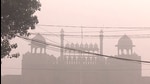 New Delhi, Nov 15 (ANI): Red Fort stands cloaked in a thick veil of smog as pollution levels continue to rise, in New Delhi on Friday. (ANI Photo) (ANI)