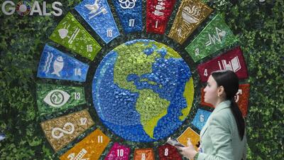 A person walks past art in the Turkey Pavilion at the COP29 UN Climate Summit on Thursday in Baku, Azerbaijan. (AP) A person walks past art in the Turkey Pavilion at the COP29 UN Climate Summit on Thursday in Baku, Azerbaijan. (AP)