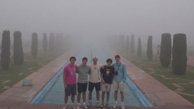 Foreign tourists pose for a picture as the Taj Mahal disappears behind a thick layer of fog, in Agra (Yatish Lavaniya) Foreign tourists pose for a picture as the Taj Mahal disappears behind a thick layer of fog, in Agra (Yatish Lavaniya)