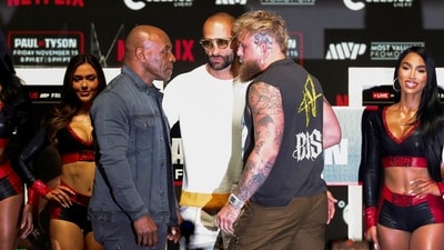 Jake Paul (right) faces off with Mike Tyson (left) during a press conference. (USA TODAY Sports via Reuters Con)