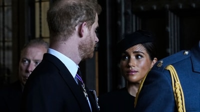 Britain's, Prince Harry, left, and Meghan, Duchess of Sussex, second left, leave after they paid their respects to Queen Elizabeth II in Westminster Hall (AP) Britain's, Prince Harry, left, and Meghan, Duchess of Sussex, second left, leave after they paid their respects to Queen Elizabeth II in Westminster Hall (AP)