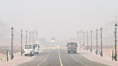 Rashtrapati Bhavan is barely visible under a thick layer of smog as air quality reels under the 'severe' category, at Kartavya Path, in New Delhi on Friday. (ANI) Rashtrapati Bhavan is barely visible under a thick layer of smog as air quality reels under the 'severe' category, at Kartavya Path, in New Delhi on Friday. (ANI)