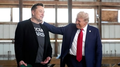 FILE - Tesla and SpaceX CEO Elon Musk, left, and President-elect Donald Trump attend a campaign event at the Butler Farm Show on Oct. 5, 2024, in Butler, Pa. (AP Photo/Alex Brandon, File) (AP) FILE - Tesla and SpaceX CEO Elon Musk, left, and President-elect Donald Trump attend a campaign event at the Butler Farm Show on Oct. 5, 2024, in Butler, Pa. (AP Photo/Alex Brandon, File) (AP)
