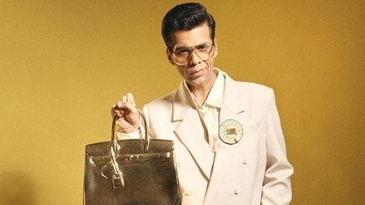 Karan Johar wore 'a pop culture installation by Sanuj Birla' and brooch by Schiaparelli. (Instagram/ Karan Johar) Karan Johar wore 'a pop culture installation by Sanuj Birla' and brooch by Schiaparelli. (Instagram/ Karan Johar)