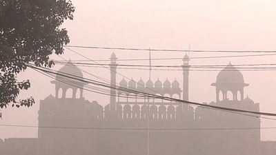 New Delhi, Nov 15 (ANI): Red Fort stands cloaked in a thick veil of smog as pollution levels continue to rise, in New Delhi on Friday. (ANI Photo) (ANI) New Delhi, Nov 15 (ANI): Red Fort stands cloaked in a thick veil of smog as pollution levels continue to rise, in New Delhi on Friday. (ANI Photo) (ANI)