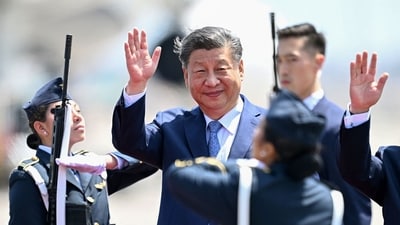 TOPSHOT - China's President Xi Jinping waves upon his arrival for the Asia-Pacific Economic Cooperation (APEC) Summit at Air Force Base 8, annexed to the Jorge Chavez International Airport, in Callao, Peru, on November 14, 2024. (AFP) TOPSHOT - China's President Xi Jinping waves upon his arrival for the Asia-Pacific Economic Cooperation (APEC) Summit at Air Force Base 8, annexed to the Jorge Chavez International Airport, in Callao, Peru, on November 14, 2024. (AFP)
