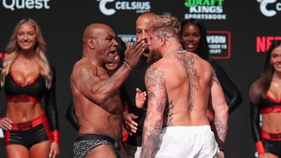 Mike Tyson, left, slaps Jake Paul during a weigh-in. (AP) Mike Tyson, left, slaps Jake Paul during a weigh-in. (AP)