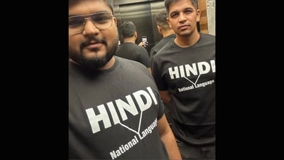 X users in 'Hindi, national language' T-shirts. (X) X users in 'Hindi, national language' T-shirts. (X)
