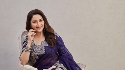 Purple is a regal colour, so no wonder Madhuri Dixit pulls off the colour so gracefully. (Instagram) Purple is a regal colour, so no wonder Madhuri Dixit pulls off the colour so gracefully. (Instagram)