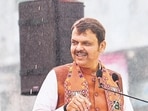 Pawar, Fadnavis indulge in rain drama Pawar, Fadnavis indulge in rain drama