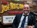Joe Rogan humorously noted Biden's happiness, contrasting it with Obama's demeanour during Trump's 2016 victory, suggesting a surreal election cycle.