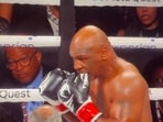 During the fight, Mike Tyson was seen biting his gloves.
