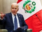U.S. President Joe Biden gestures as he meets with Peru's President Dina Boluarte at the Asia-Pacific Economic Cooperation (APEC) summit in Lima, Peru, November 15, 2024. REUTERS/Leah Millis
