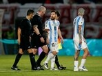 Argentina's Lionel Messi talks to referee Anderson Daronco.