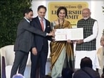 Prime Minister Narendra Modi with Shobhana Bhartia, chairperson and editorial director of HT Media Ltd, on Saturday. Prime Minister Narendra Modi with Shobhana Bhartia, chairperson and editorial director of HT Media Ltd, on Saturday.