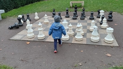 In a photo, Malti Marie was seen on a huge chess board in a garden. 