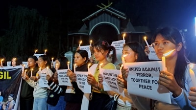 Students from various schools and colleges took part in a candlelight vigil organised by Democratic Students' Alliance of Manipur (DESAM) (ANi Pic Service) Students from various schools and colleges took part in a candlelight vigil organised by Democratic Students' Alliance of Manipur (DESAM) (ANi Pic Service)