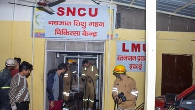 Firefighters work after a fire broke out in a neonatal intensive care unit at Jhansi Medical College hospital in Jhansi (AP)