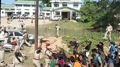Police lathi-charged the protesters at the premises of Assam’s Silchar Medical College and Hospital on Saturday and in response, they pelted stones at the police, leaving many officers injured. Police lathi-charged the protesters at the premises of Assam’s Silchar Medical College and Hospital on Saturday and in response, they pelted stones at the police, leaving many officers injured.