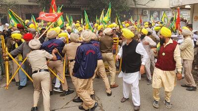 Police preventing activists of BKU (Ekta-Ugrahan) from going near the election rally venue in Gidderbaha, where AAP national convener Arvind Kejriwal and CM Bhagwant Mann were to address the gathering on Saturday. (Sanjeev Kumar/HT) Police preventing activists of BKU (Ekta-Ugrahan) from going near the election rally venue in Gidderbaha, where AAP national convener Arvind Kejriwal and CM Bhagwant Mann were to address the gathering on Saturday. (Sanjeev Kumar/HT)