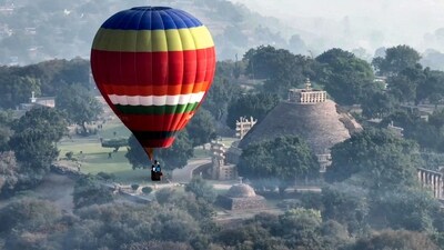 Raisen, Nov 13 (ANI): A hot air balloon flies in the air over UNESCO's world heritage site Sanchi Stupas during a hot air balloon show. (ANI Photo) (Sanjeev Gupta) Raisen, Nov 13 (ANI): A hot air balloon flies in the air over UNESCO's world heritage site Sanchi Stupas during a hot air balloon show. (ANI Photo) (Sanjeev Gupta)
