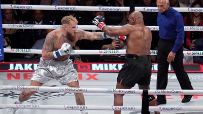 Jake Paul, left, fights Mike Tyson during their heavyweight boxing match, Friday, Nov. 15, 2024, in Arlington, Texas. (AP Photo/Julio Cortez) (AP) Jake Paul, left, fights Mike Tyson during their heavyweight boxing match, Friday, Nov. 15, 2024, in Arlington, Texas. (AP Photo/Julio Cortez) (AP)
